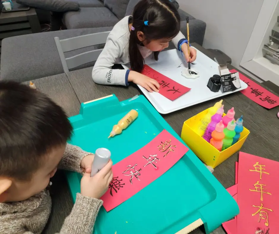 Children are working on Free Chinese New Year Banners