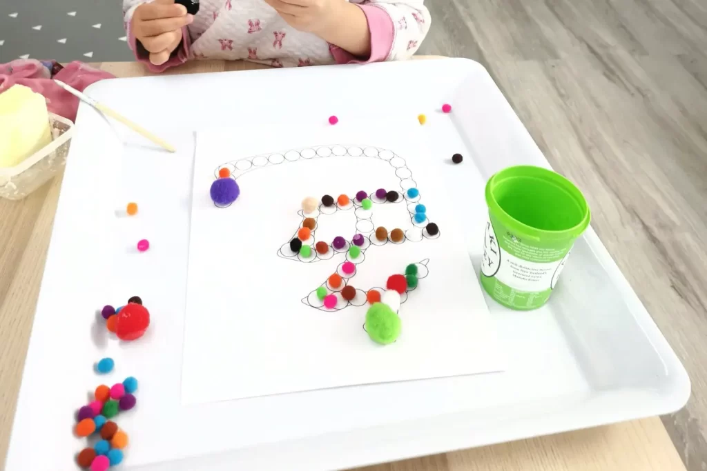 learn writing chinese characters for kids - pom pom balls